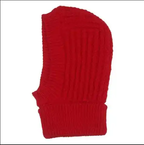 Cagoule en laine rouge tricotée, accessoire d’enfance des années 70. Illustration de la chronique « Allez, sois cool, mets ta cagoule » d’Hervé Gransart.