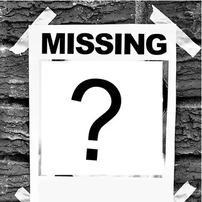 Affiche « Missing » scotchée sur un mur de briques, avec un point d’interrogation en guide de portrait. Illustration de la nouvelle « Missing » de Hervé Gransart.